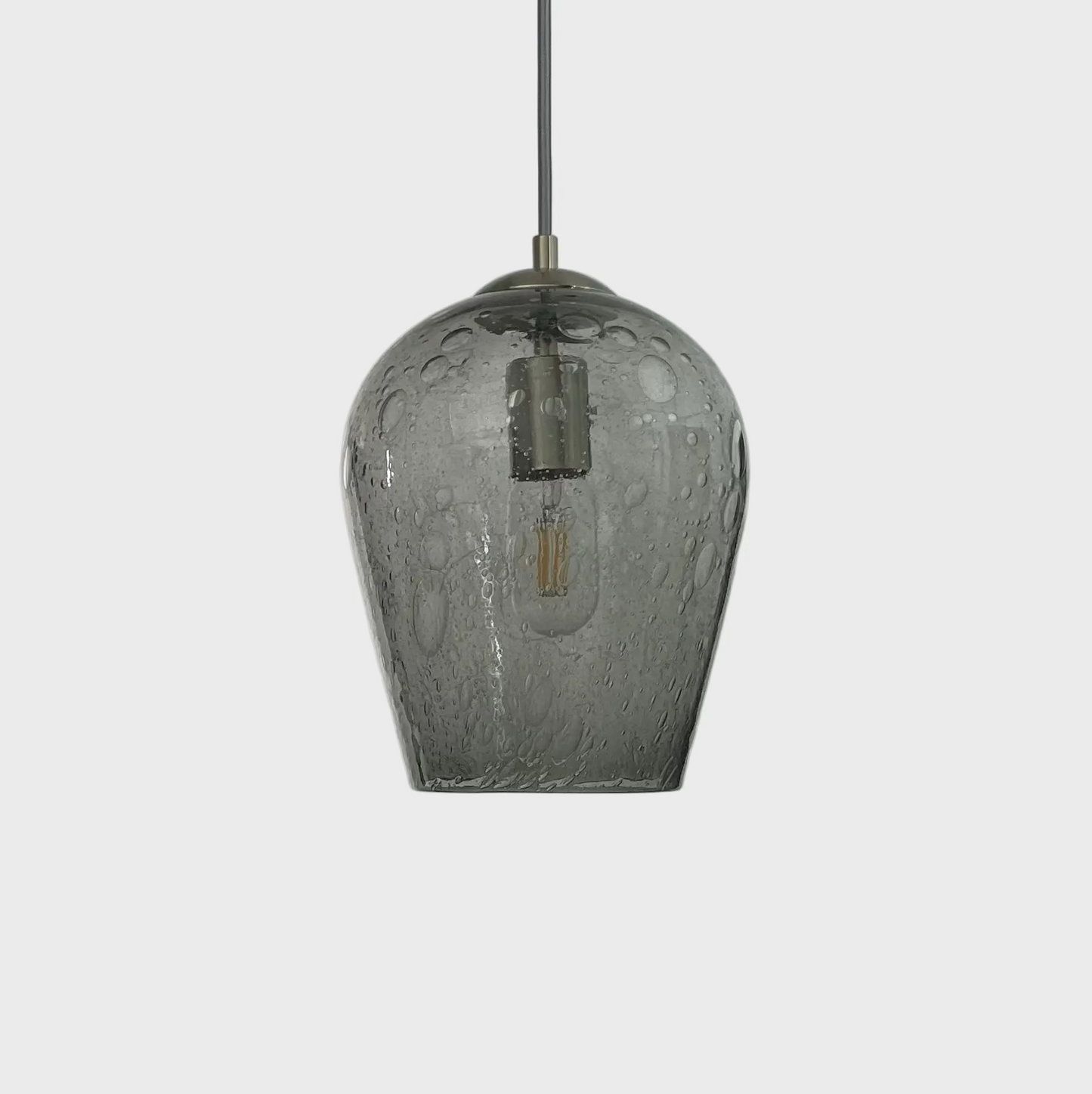 Grey bubble glass pendant light on a white background
